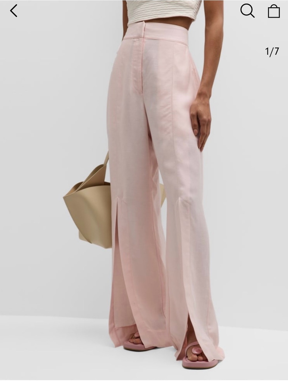 BONDI BORN Piana High-Waist Slit-Cuff Flare Pants in a light pink hue